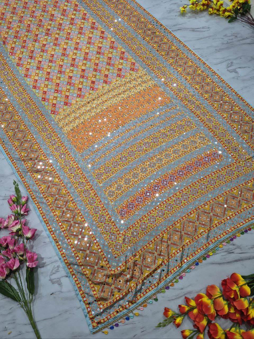 Chinon silk mirrorwork saree draped on model - Abriha Trends