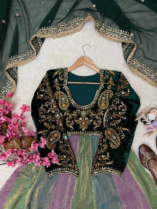 Bottle green velvet bodice with gold sequin and zari paisley embroidery, with sequin fringe georgette dupatta