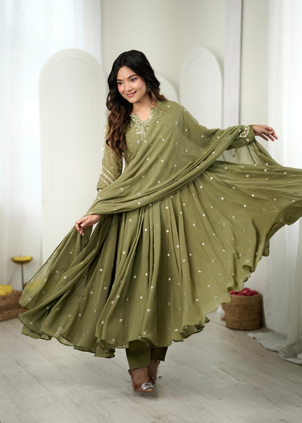 Mehendi green embroidered Anarkali gown with wide flared dupatta spread