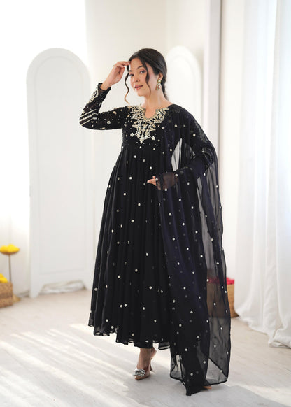 Model in black sequin embroidered Anarkali gown with dupatta, close-up pose