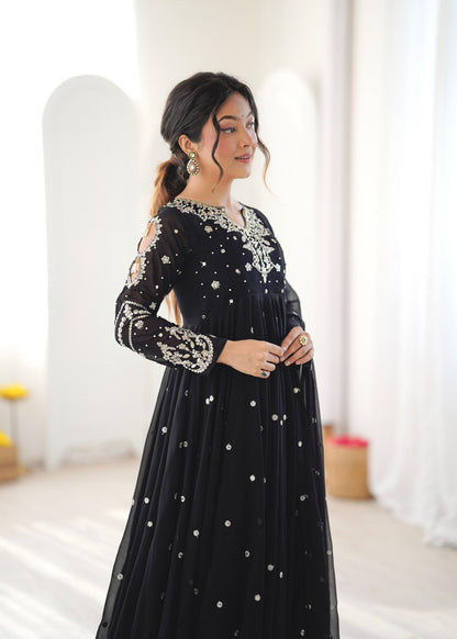 Side profile of black embroidered Anarkali gown showing sleeve embroidery detail