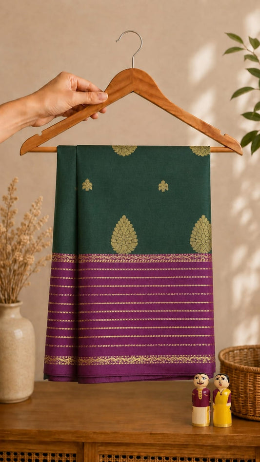 Bottle green Banarasi semi katan silk saree with purple zari border and mango booti motif