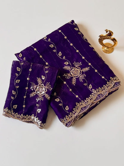 Purple Fendy chiffon saree with gold sequin embroidery and scalloped border, folded with blouse piece