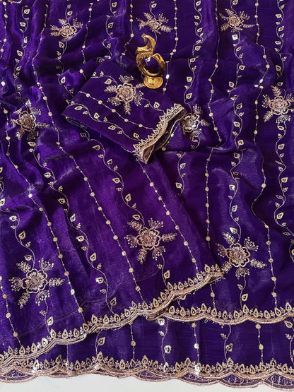 Purple Fendy chiffon saree spread out showing all-over floral sequin embroidery