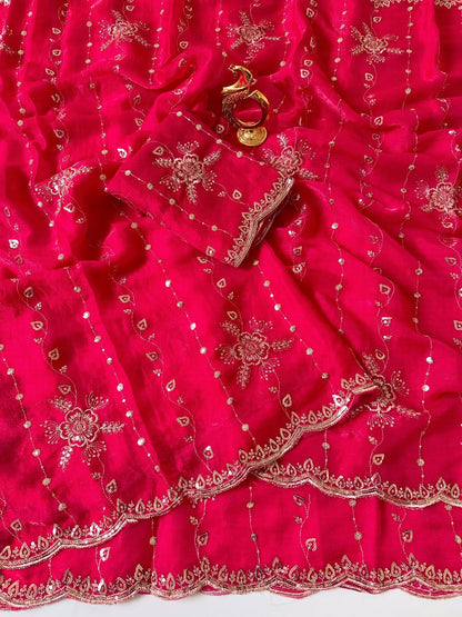 Rani pink Fendy chiffon saree spread out showing all-over floral sequin embroidery
