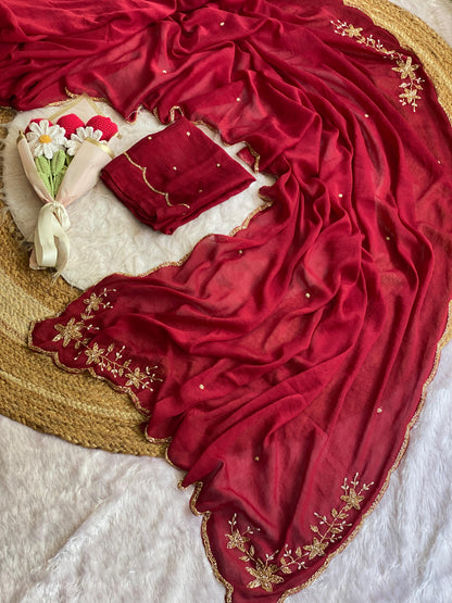 Maroon crush silk saree spread out showing butta pallu, scattered bead buttis and scalloped gold bead border