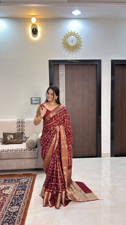 Maroon Kanjivaram Bandhani cotton silk saree with floral jaal and zari border, full drape