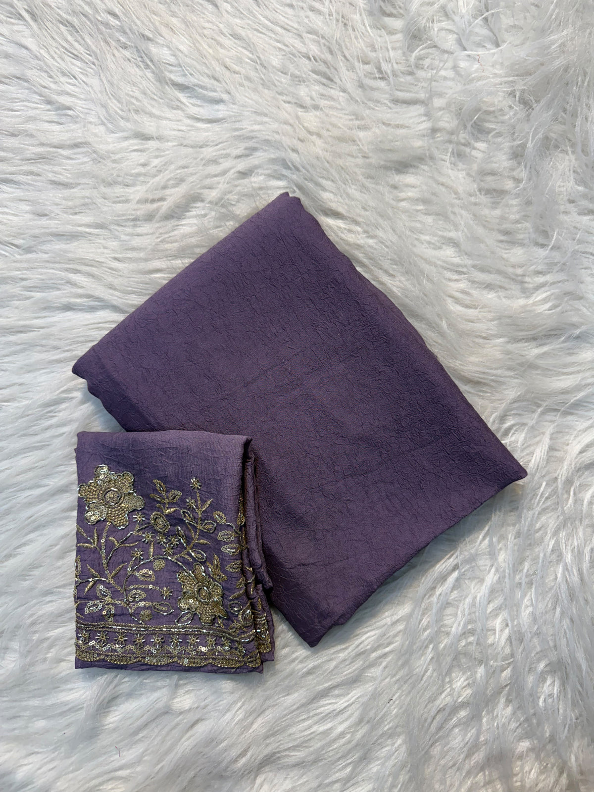 Mauve plain georgette saree with sequin floral embroidered blouse and scalloped border