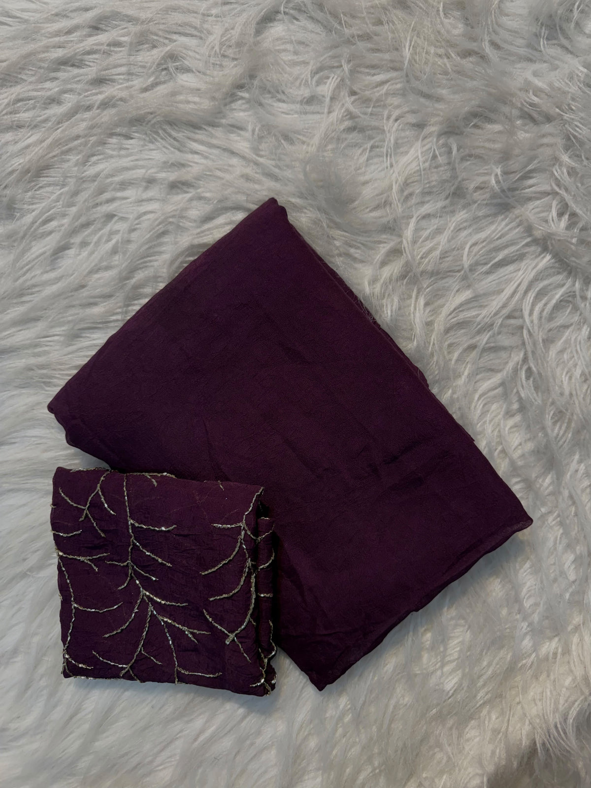 Wine plain Rangoli viscose georgette saree with embroidered blouse featuring metallic branch motif