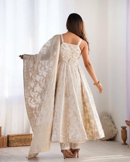Back view of ivory Anarkali gown with corset dori lace-up and sheer jacquard dupatta