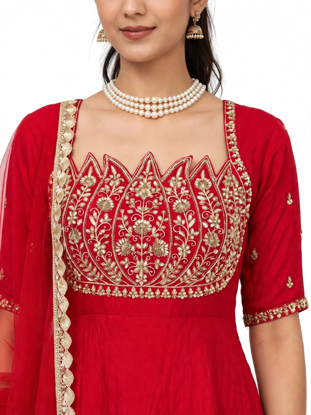 Close-up of lotus-shaped yoke with beads, cut dana and sequin work on red Anarkali gown
