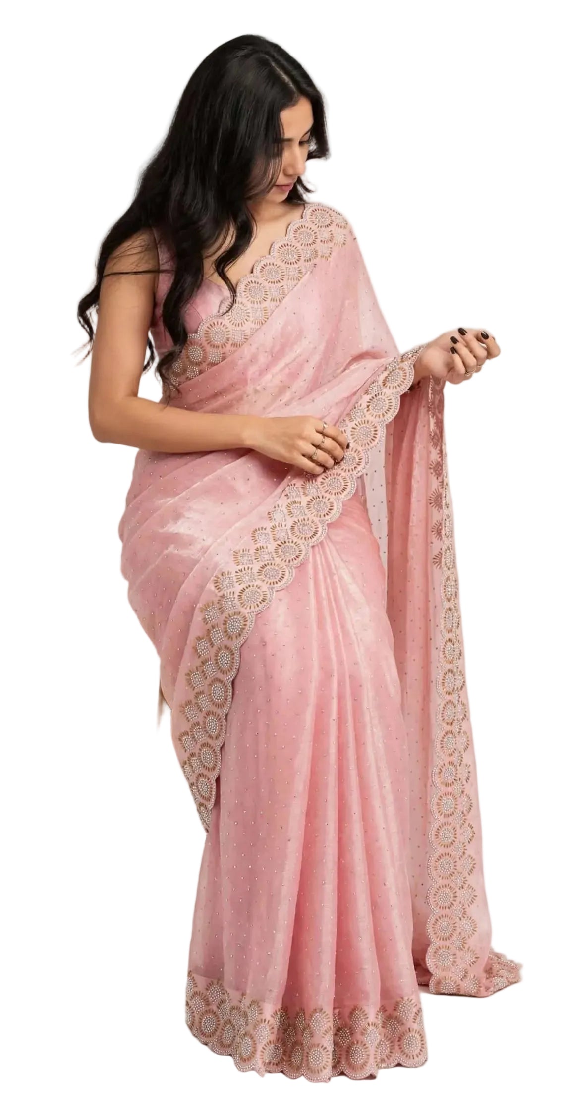 Seated model draping the pink space silk saree, showing the stone dotted body and scalloped border
