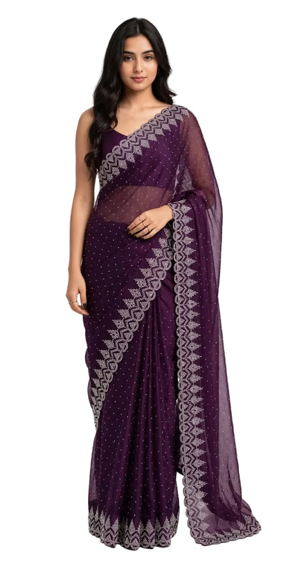 Model wearing a purple georgette saree with stone work, front view showing the scalloped stone border on the pleats and pallu